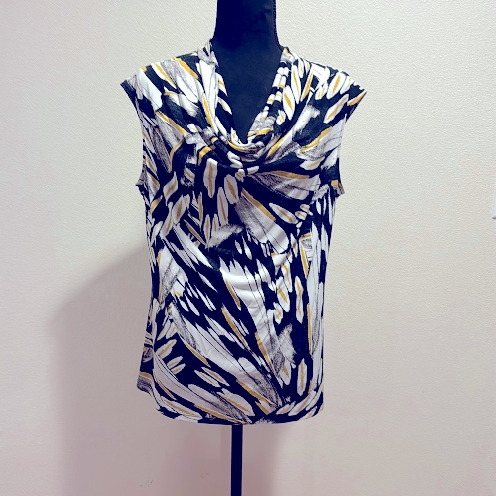 Short sleeve cowl neck blouse.